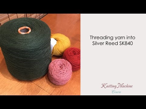How to thread yarn in a knitting machine