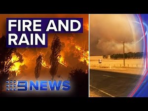 Australian bushfire towns wake to rain, threat of mega-fire looms | Nine News Australia