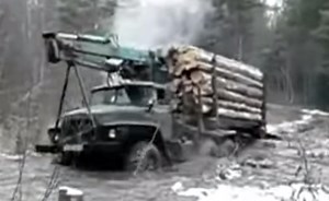 Russian Logging Truck Through The Mud....Never Would Have Thought He Would Make It