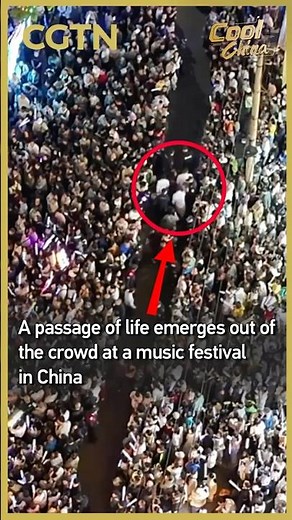 A passage of life emerges out of the crowd at a music festival in China #coolchina