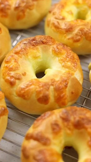 Chicken Cheese Bagel 🥯 Recipe for 6 bagel lukewarm water 160ml - sugar 10g instant yeast 6g bread flour 250g salt 4g Dough Method Preparation lukewarm water 160ml - sugar 10g instant yeast 6g mix well In a separate bowl add bread flour 250g salt 4g mix well add the instant Yeast water knead the dough for 8min rest the dough for 40 min divide into 6 equal dough Stuffing 250g chopped boiled chicken 80g cream cheese After making the bagel rest the dough for 30min Grated Cheese on the top Bake on a