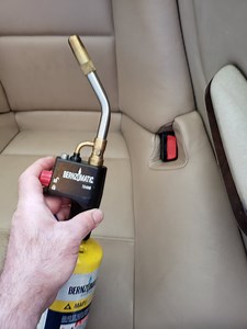 Faded seat belt release button fix