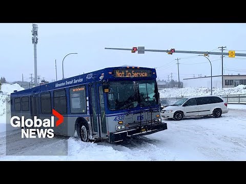Alberta clipper storm system dumps a foot of snow onto Edmonton