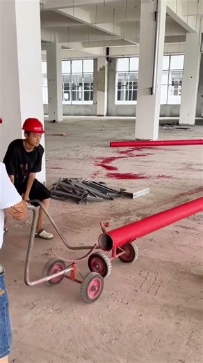 A Clever Tool That Helps Workers Move Heavy Steel Pipes with Ease