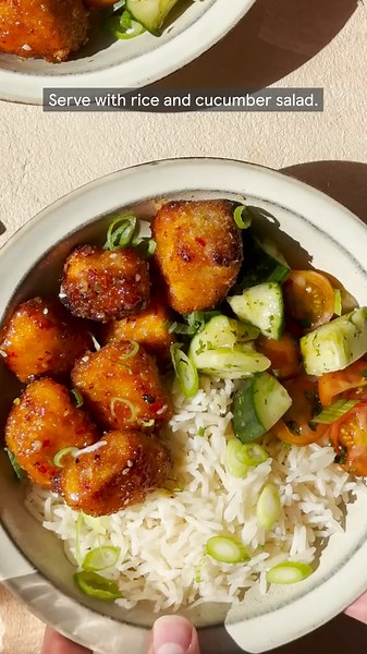 Air-fryer Firecracker Salmon Bites Serves 4 1 tbsp groundnut oil or sunflower oil 100g panko breadcrumbs Juice 1 lime 1 tbsp runny honey 4 tbsp sweet chilli & garlic sauce 1 tsp ginger paste 1 tsp sesame oil 1 tbsp reduced-salt soy sauce 2 tbsp sesame seeds 1 green finger chilli, thinly sliced (optional) 4 Boneless Salmon fillets (520g) 1 spring onion, sliced 1. In a wide bowl, mix together the panko breadcrumbs with the oil until well coated; set aside. 2. Stir together the lime juice, honey, s