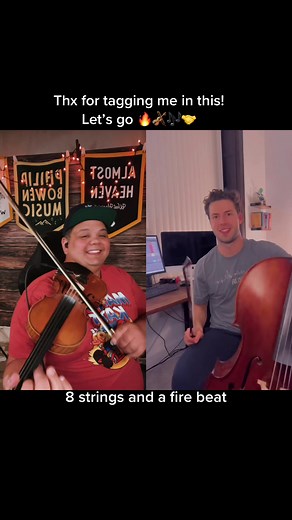 Musical Violin and Cello Duet with a Fire Beat