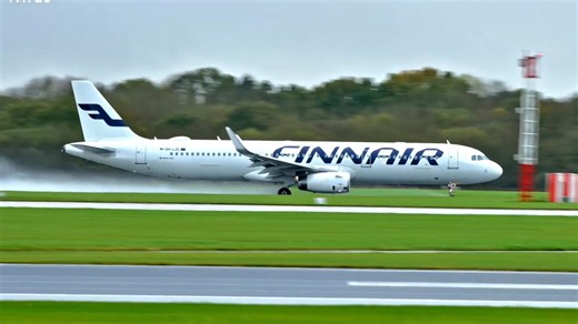 Giant jets taking off on rain-soaked runways