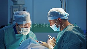 Surgeons work with medical instruments. Professional doctors perform a plastic surgery in clinic. Blepharoplasty for a patient.