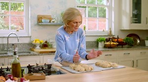 Butter, butter and more butter. Mary Berry the cook shares the 50-year-old secrets to her luxury hot cross buns. Join Mary Berry’s Easter Feast. Tuesday. 8pm. BBC Two. | BBC Two
