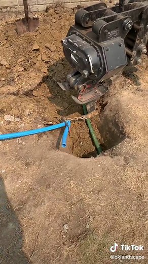 Installing a sprinkler tube #fyp #landscape #lawncare #rainbird #sprinkler