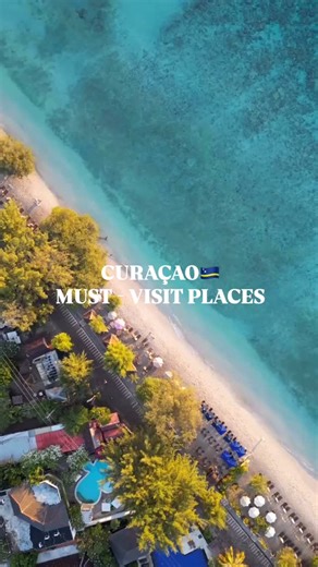 Curaçao Travel Guide on Instagram: "Must-visit places in Curaçao 🇨🇼 This island is full of iconic spots and hidden gems! Here are a few you can’t miss: 🏖️ Cas Abao – turquoise water + soft white sand = beach day goals 🌈 Handelskade – the pastel-colored waterfront straight out of a postcard 🌳 Hofi Mango – peaceful nature trails and centuries-old mango trees 🍹 Mambo Beach – Chill Beach Club is my fav spot for cocktails, bites and vacay vibes 🌊