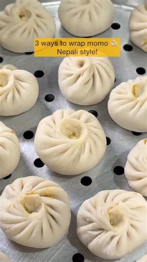 sinincooks on Instagram: "Learn 3 classic Nepali momo wraps 🥟 : • Round for buff • Full braid for veg • Half-braided (one side) for chicken Which style do you use the most? Let’s settle this in the comments 👇 . . . . . #homecooking #momo #momowrapping #nepalifood #sinincooks #nepalireels #comfortfoods"