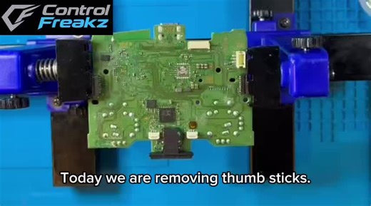 Removing the original thumbsticks ready for a TMR upgrade 🎮 The factory thumbstick modules are being carefully removed from the controller board. Follow for our upcoming installing TMR thumbsticks video. TMR thumbsticks are designed to help stop stick drift and give a smoother, more accurate response. More custom controller builds coming soon 👀 ##ps5controller##customcontroller##controllerrepair##gamingtech##stickdrift
