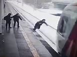 Horrific moment teenager falls in front of train which drags him along platform