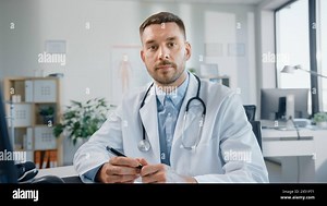 Web Doctor's Online Medical Consultation: Portrait Shot of Caucasian Male Physician is Making Conference Video Call with a Patient. Health Care Specialist Giving Advice. POV Point of View Shot Stock Photo - Alamy