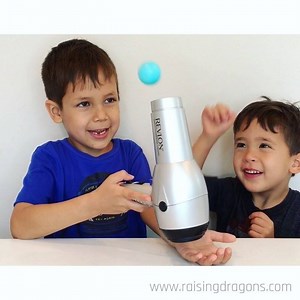 Floating Ping Pong Ball 🏓 age 4-8 🏓 For this experiment you will need a hair dryer and a ping pong ball. Point the hair dryer up and turn on the highest setting (but use warm or cool air). Place the ping pong ball over the dryer and notice how it appears to float above the dryer even when you move the dryer around. This is because the hair dryer produces a column of quick-moving air with lower air pressure and the surrounding air with higher air pressure holds the ball in place. So cool! 👍🏻 