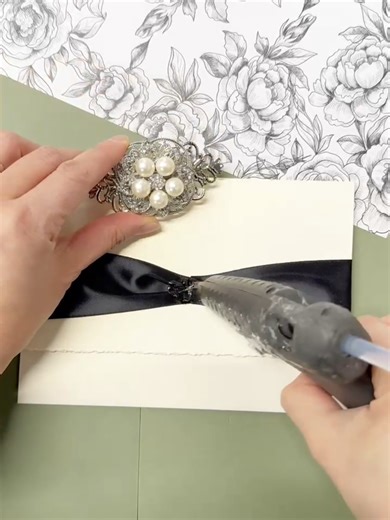 Stephita Wedding Invitations. Creating a deckle torn edge pocket style wedding invitation with ribbon and vintage style brooch. For more designs and pricing visit our website. . . . #wedding #weddingtiktok #weddingday #bride #weddingplanning