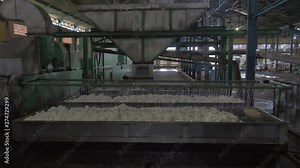 Horizontal moving loading hopper was added to our static screen for loading wet rubber crumbs from the crumb transfer pump into the dryer trolley.