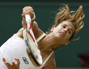 Defending champ falls at Wimbledon