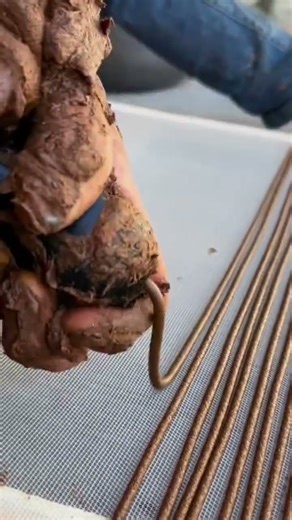 drying the clay which is made into small, thin pieces like sticks to make additional decorations