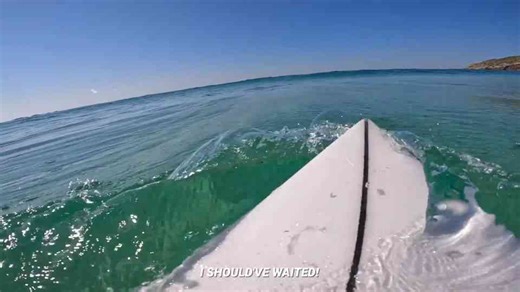 He drove the coast at dawn and surfed alone with what was lurking below