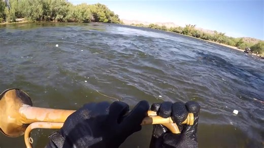 He went river diving and found a trumpet, because apparently fish needed jazz