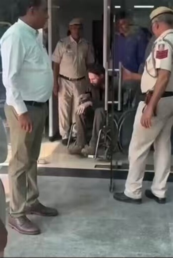 Matthew VanDyke seen publicly in India without a mask for the first time, and in a wheelchair.He is accused of going to Myanmar to train rebels against India, now appears injured and limping.