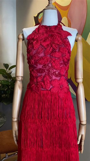 A dress that moves as beautifully as the woman wearing it. Finished with dimensional florals and cascading fringe, this bespoke design is made to shine from every angle and every step. Because extraordinary moments deserve extraordinary pieces. #bytinni #bytinnibridal #outfit #dress #fit