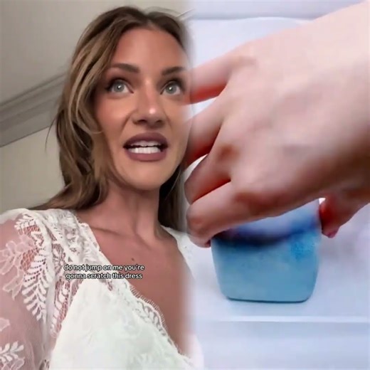 Putting on my wedding dress for our 10th anniversary. Didn’t expect that reaction from