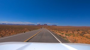 Forrest Gump Point, Monument Valley. Forrest Gump Point, a scenic viewpoint along US-163 in Utah, gained fame from the movie "Forrest Gump" where the character stops running. It's a popular spot for photos, especially at sunrise and sunset, due to the iconic view of Monument Valley's sandstone formations. The scene in the movie is where Forrest decides he's "pretty tired" and wants to go home after his cross-country run. Please note all photos, videos and reels on this page were taken by myself