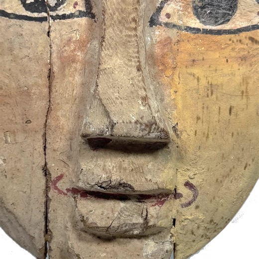 Sarcophagus Mask on Stand Egypt, Ptolemaic Era, 600-30 BCE Item #:1986, Ht: 17.5” https://vanishingarts.gallery/product/wood-sarcophagas-relief-mask-egypt-c-664-30-bce-1986/ ● In elite Egyptian burial rites, Sarcophagus masks were placed over the head of the mummy inside the coffin. ● They were believed to provide protection and to help the departed soul find a body in which to reside in the afterlife. ● Ptolemaic Era masks like this one combined Egyptian funerary art with Greek influences, repr