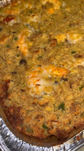 Shaquane Dantzler on Instagram: "Loaded Seafood Cornbread Stuffing or Dressing. Y’all can call it whatever y’all want, all I know is it was Bussing!"