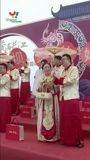 Couples celebrate traditional Chinese weddings by the Dam
