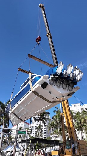 Ever wondered how the boats make their way up at the entry of International Boat Shows? Check out this 51' Intrepid Paneca being put on up at this years Palm Beach Boat Show 🤯 #boattrader #boattransportation #intrepidpowerboats
