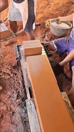 Cutting Red Bricks Manually With Professional Wire Press Tools For Construction