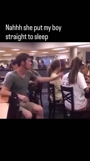 Viral Moments Worth Reacting To on Instagram: "Follow to join the FAMILY🫶🏼 This viral clip captures a classic, high-stakes prank in what appears to be a busy university dining hall. The video begins with a young man sitting at a table, leaning over to pull a timeless “tap on the opposite shoulder” trick on a girl sitting next to him. As she turns her head, looking for the culprit, the prankster lets out a series of triumphant, high-pitched “Yaga!” shouts, celebrating his minor victory with inf