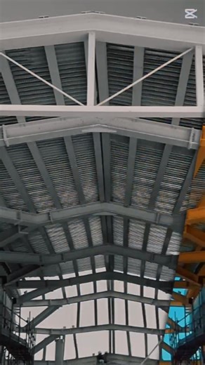 An architectural statement rising by the sea. Ramla Bay Hotel’s new steel roof structure bridges the towers, forming a dynamic new lobby that brings light, connection, and modern design together. | E&L Enterprises Ltd