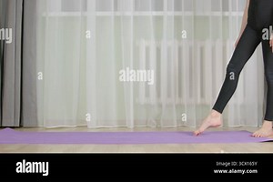 Flexible girl training acrobatic exercise in home. Acrobat girl bending to gymnastics bridge. Fit young woman exercising gym on home training Stock Video Footage - Alamy