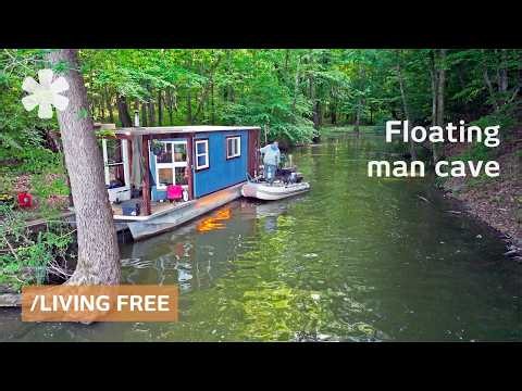 Solo on river shantyboat: quits city to live free at edge of society