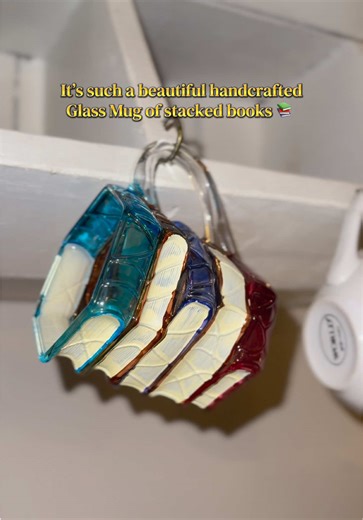 I’m obsessed with my book mug 📚 I can’t wait to move so I can finally set up my book nook. 🙏🏽🥹 #mugs #mug #bookmug #booklovers #readingnook