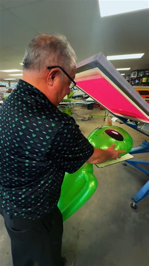 7.6K views · 110 reactions | In today’s episode of "Does It Print?" we attempt first contact. Inflatable alien vs. Mike and an old school manual press.  | Shirt.Co | Facebook