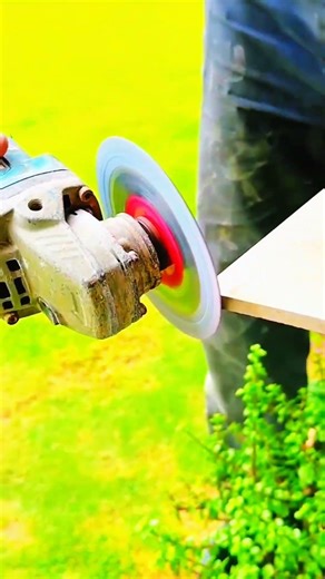 Tile presses wall—hand holds rhythm of mortar, edge, and bond bonds true with crafted precision