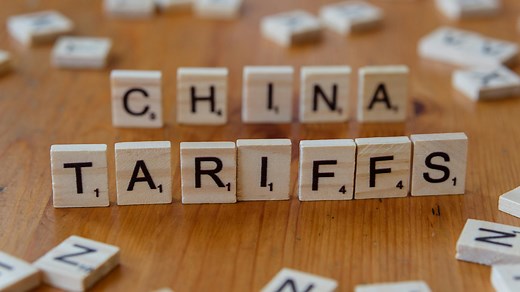 How do tariffs help protect domestic industries?