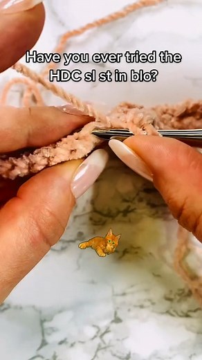 Have you tried HDC BLO? Here's an easy hat pattern using this beautiful stitch: https://www.nickishomemadecrafts.com/knit-look-crochet-hat/ #crochet #yarn #learntocrochet | Crochet Patterns & Tutorials by Nicki's Homemade Crafts