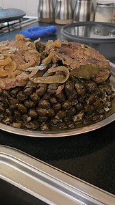 WARAK ENAB... the Lebanese comfort food you didn’t know you needed! These tender vine leaves are stuffed with a zesty mix of rice, herbs, and spices, then slow-cooked until melt-in-your-mouth perfection. Whether you’ve tried them before or this is your first bite into Middle Eastern tradition, Warak Enab will win your heart one roll at a time 💚 #WarakEnab #VineLeaves #LebaneseFood #MiddleEasternCuisine #ComfortFood #Dolma #StuffedLeaves #VincenzosPlate | Vincenzo's Plate
