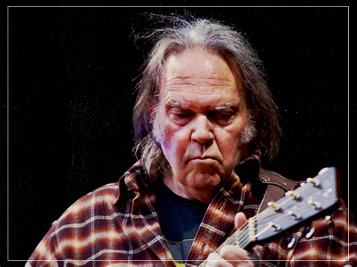 Who sings the backing vocals on Neil Young's 'Harvest Moon'?