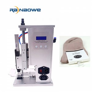 [Hot Item] Industrial Manufacturing Pnuematic Sock Tagging Fixing Machine