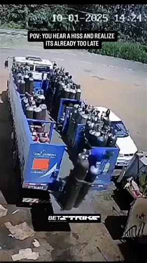 atomicpulsex | A truck loaded with dozens of compressed gas cylinders (likely propane or LPG) is parked on a roadside loading area. Workers are seen... | Instagram