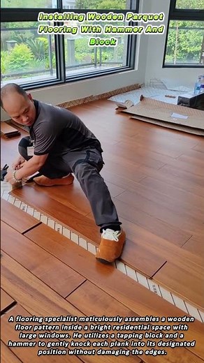 Installing Wooden Parquet Flooring With Hammer And Block