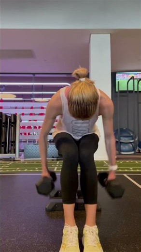 Seated bent over dumbbell reverse fly